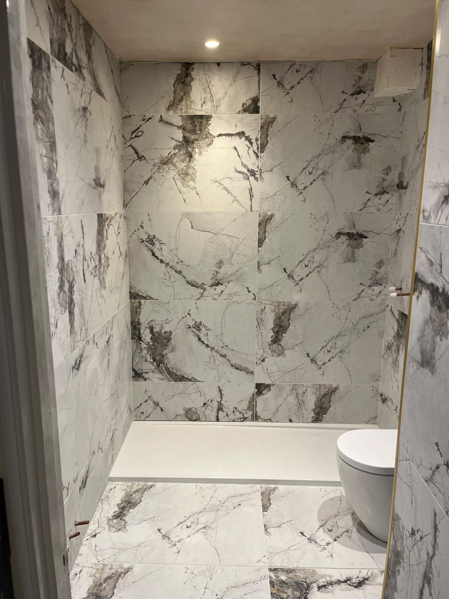 Marble-effect shower enclosure and shower tray
