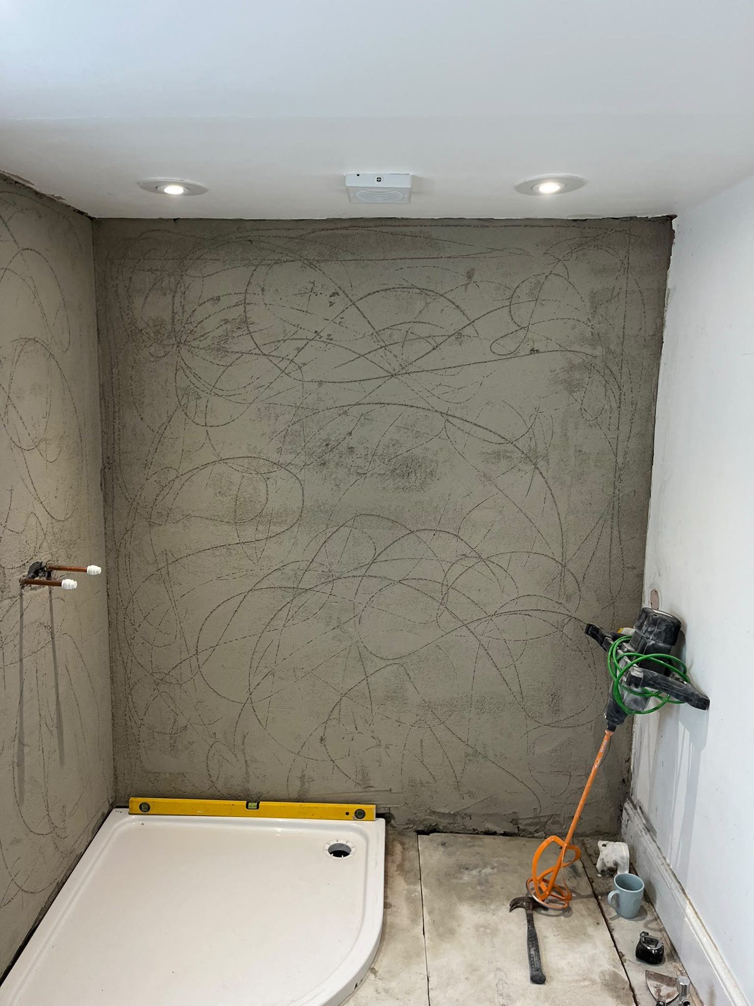 Alternative view of rendered shower room walls and tray